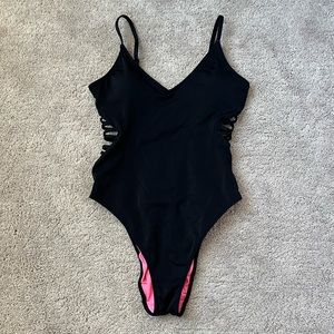 One piece black swimsuit with cut out sides